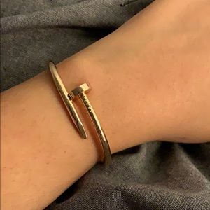 Nail bracelet in rose gold